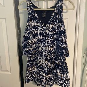 Adorable worn once blue and white romper with top overlay.